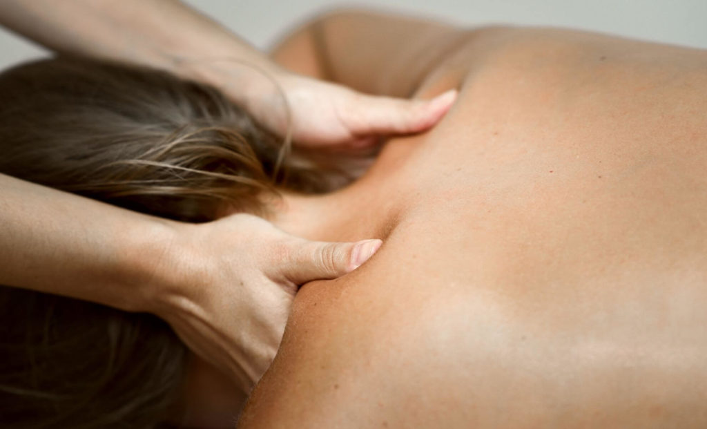 massage therapy to release tight shoulders