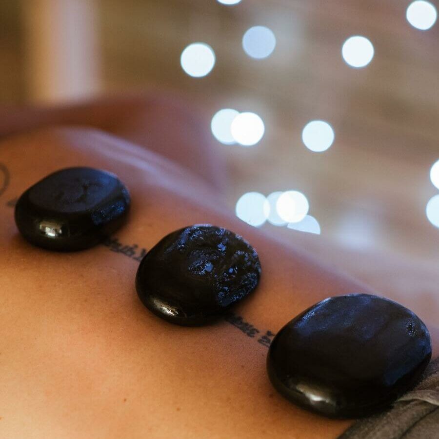 Hot stone massage therapy by Rebalance massage london